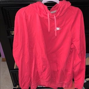 Pink Nike cowl neck.